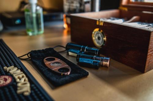 Cutter, Lighters, Cigars at New Element Barber